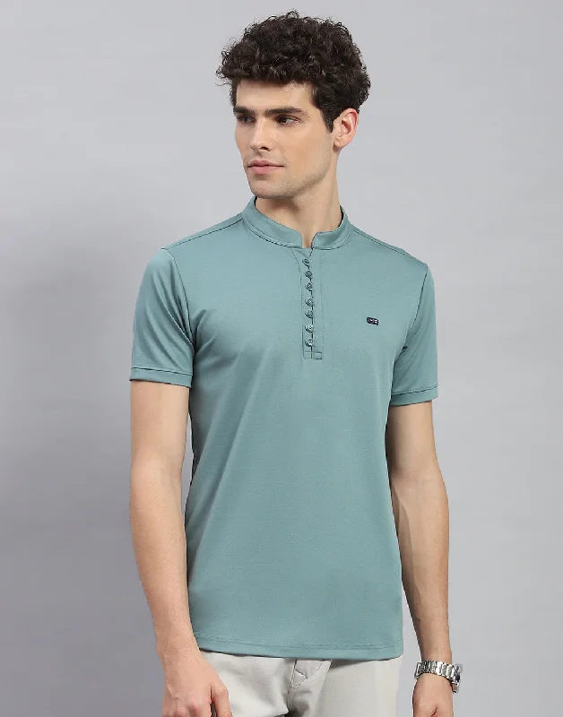 stylish short sleeve shirts for travel and leisure -Men Green Solid  Mandarin Neck Half Sleeve T-Shirt