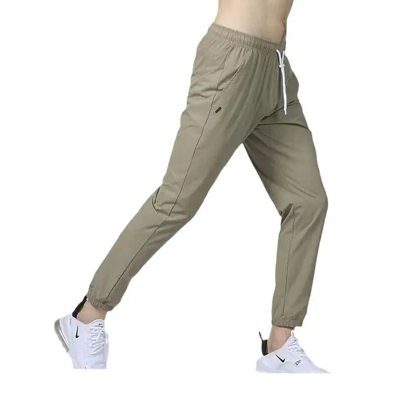 Men's pants with fun prints-Men's Nylon Mid Elastic Waist Closure Solid Pattern Casual Trousers